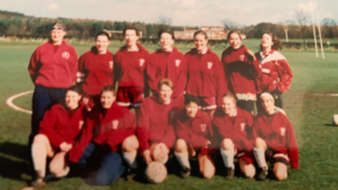 A photo of the Loughborough Women's Football team in a red kit, taken in 1994